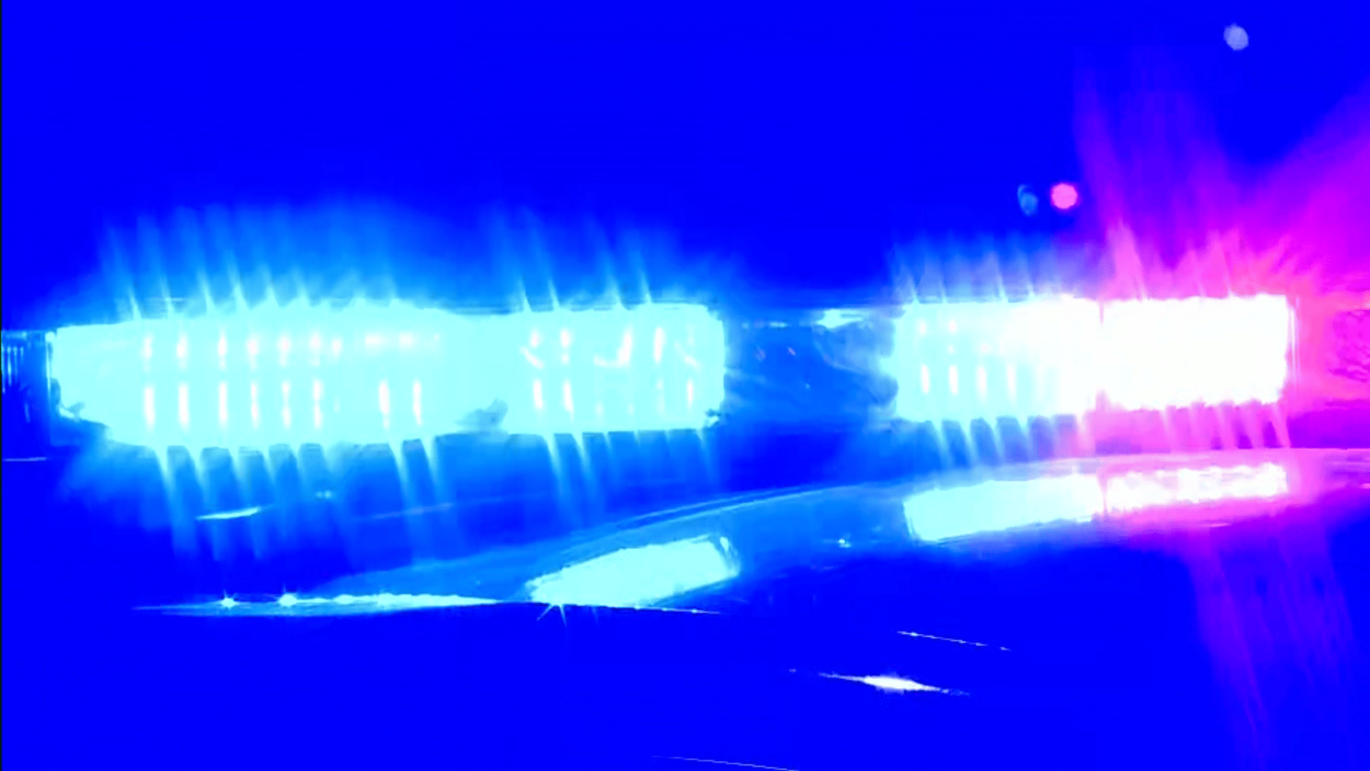 Police-lights-blurred-nighttime.png